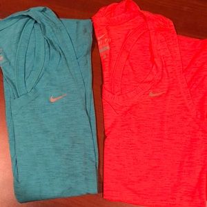Pair of Nike dri-fit athletic tank tops